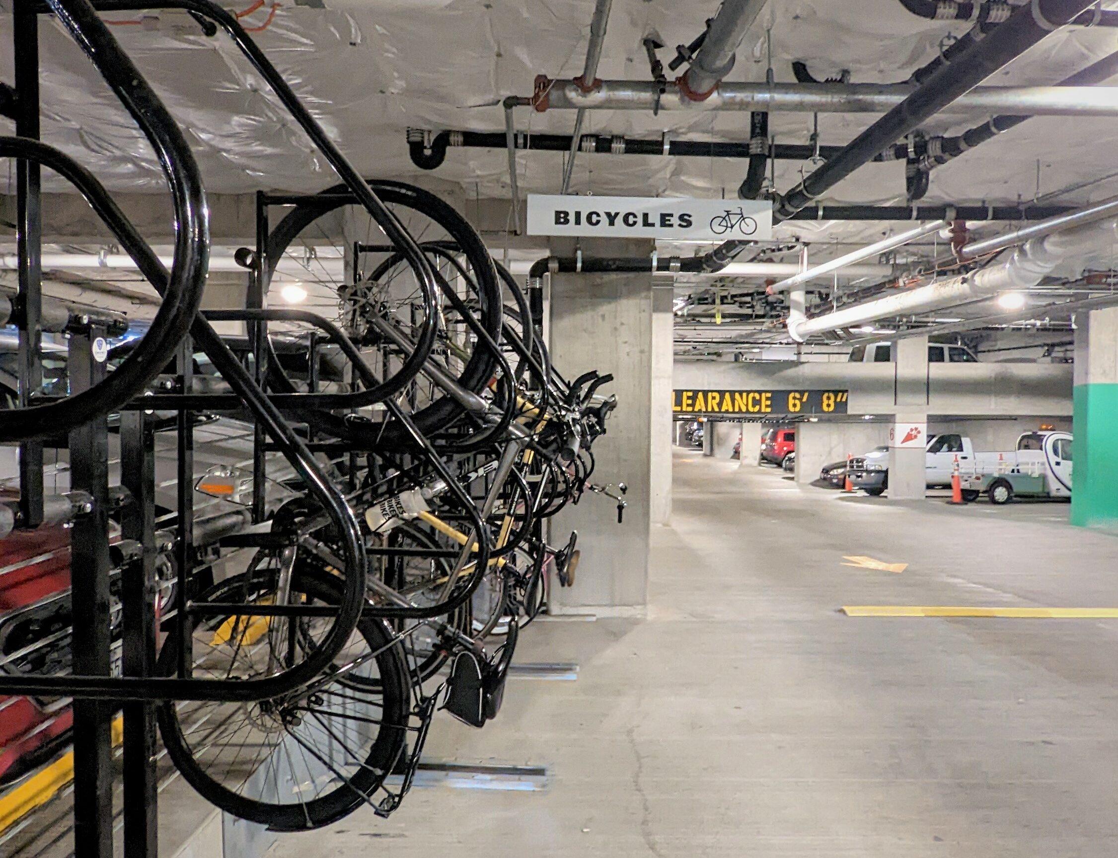 bicycle rakes inside a parking garage at pike place market