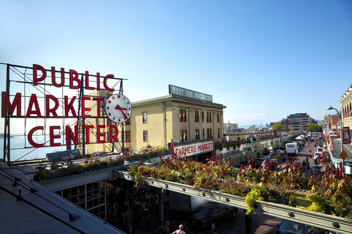 16 Things You May Not Know About Pike Place Market Pike Place Market   Public Market Center Clock Sign Summer 